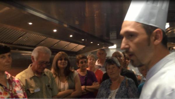 (A clip from a video) Chef Mihai says that only eight people are needed to feed the ship.